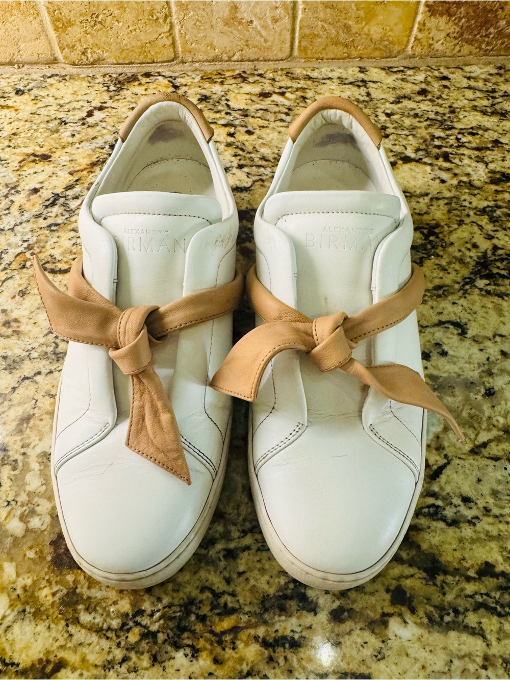 Alexandre Birman Asymeyric White Leather Slip-On Sneakers with Tan Knot